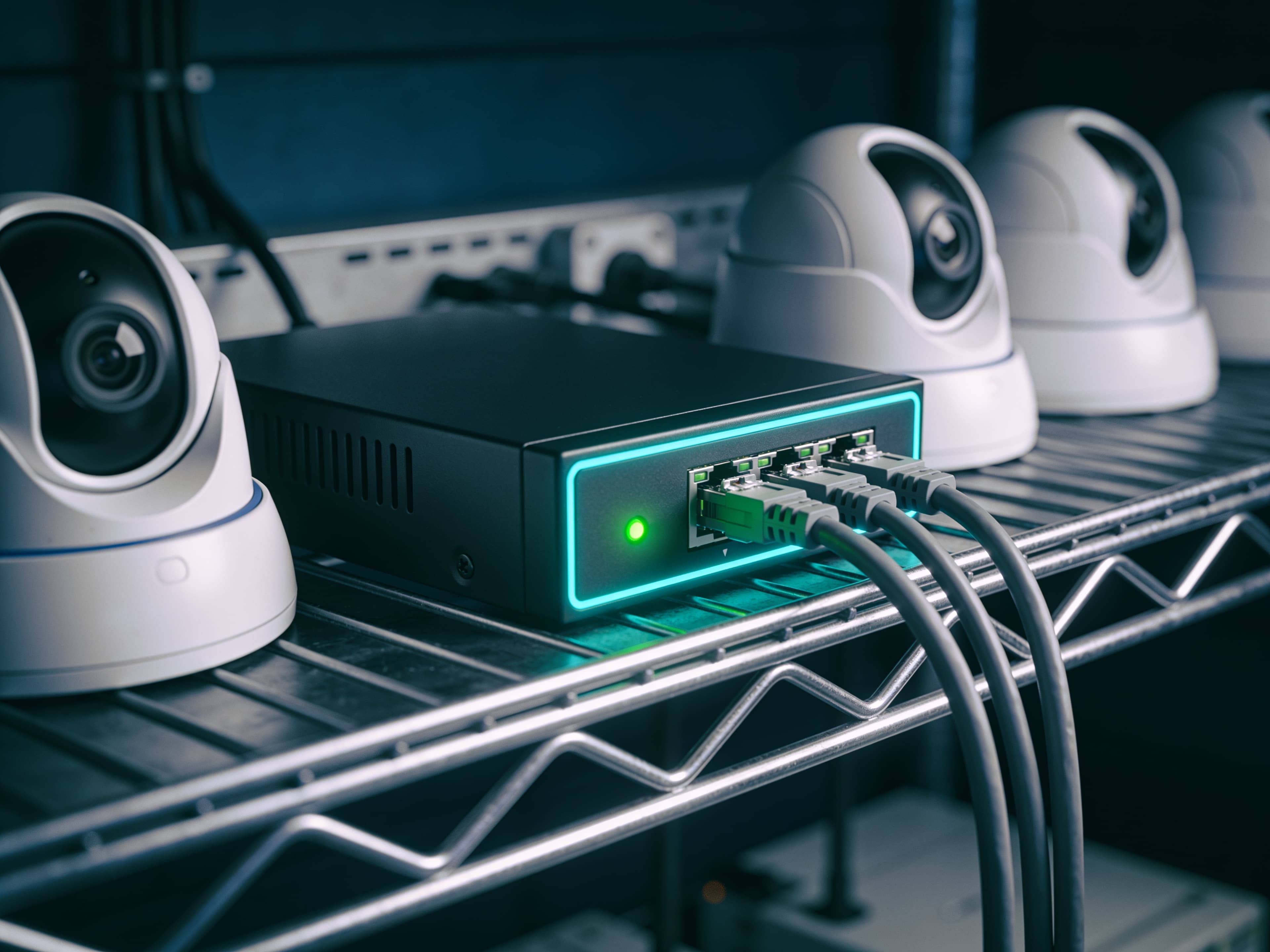 Compact SpyDocs edge device installed next to dome CCTV cameras